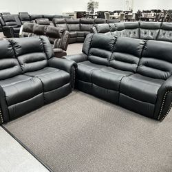 New Reclining Couch  / Love Seat .  Black Leather .  Free Delivery !