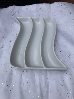 A Wavy White Ceramic Serving Or Olive dish Dish, $9