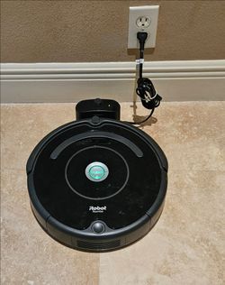 iRobot Roomba 675 Wi-Fi Connected Robot Vacuum with Charging Caddy