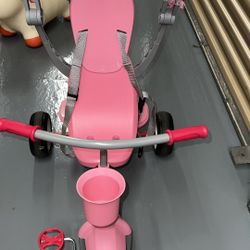 4-in-1 Stroll ‘N Tike Pink Radio Flyer