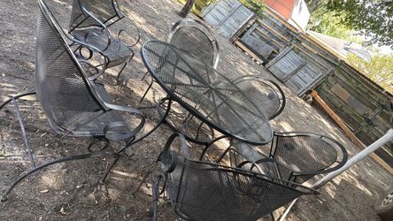 mesa de patio sillas mesedoras
