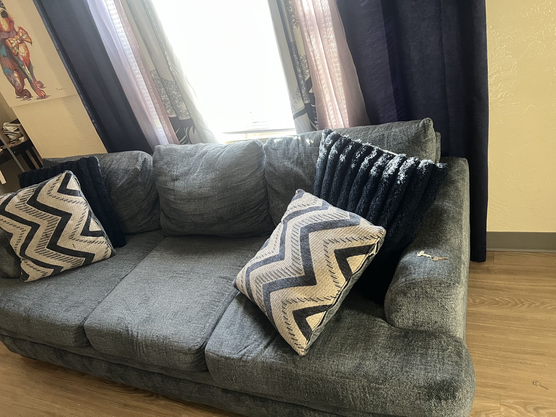 Blue Couch With Pillows