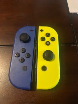 Nintendo Switch Joycons Blue and Neon Yellow OEM