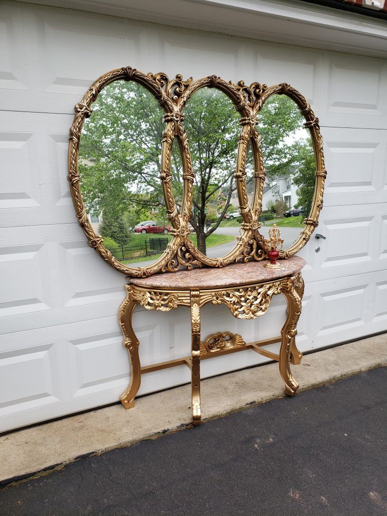 Marble top console table with Gold Hollywood Regency triple ring Mirror and candle holder