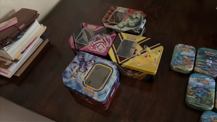 Pokeman tins and cards