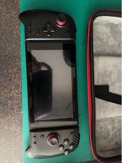 Nintendo Switch V2  with Hori ergo grip joy cons, pro controller, dock, and carrying case
