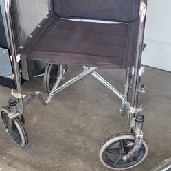 Transport wheelchair