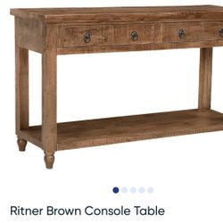 Ritner Brown Console Table. 