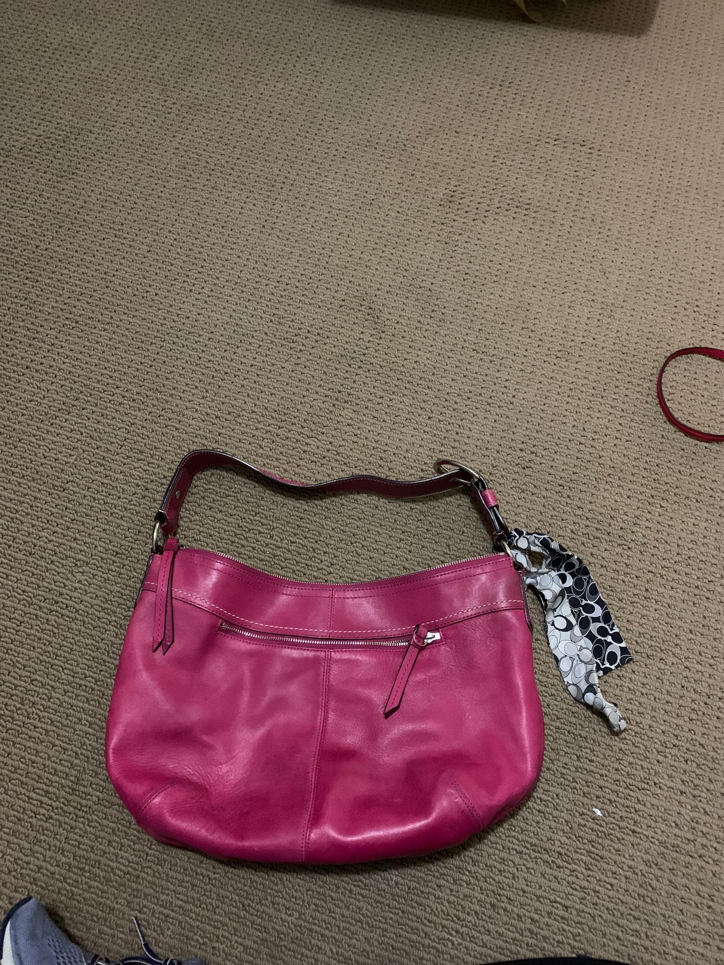 Coach pink leather purse with storing bag