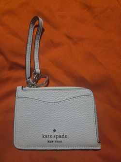 Kate Spade New York pebbled leather wristlet card case in Ocean Fog.