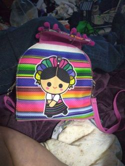 Iconic Mexican imagery such as the Lele doll or Frida Kahlo