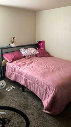 $300 queen bed w/ metal frame. Brand  new . Always in guest room. Comes with frame and bedding. Must disassemble. Easy.