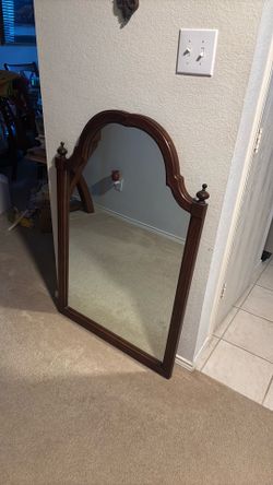 Mirror with wooden frame