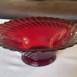 Ruby red glass swirl footed bowl with scalloped rim. 10”