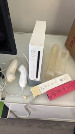 Wii and 2 remotes plus shocks