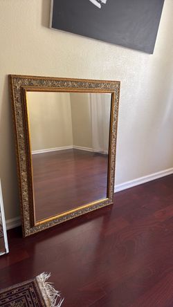 Gold mirror