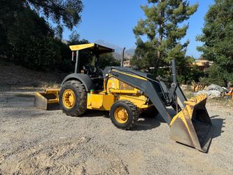 John Deere skip loader 210k ep