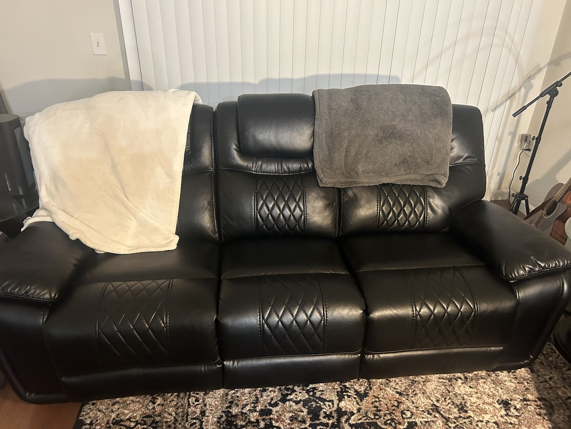 Two Leather Reclining Couches