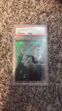 Luka doncic rookie card green essentials psa 8