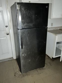 GE® 18.3 Cu. Ft. Black Top Freezer Refrigerator