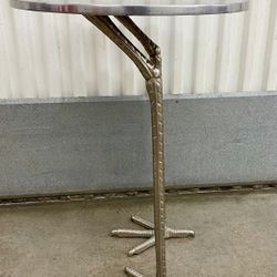 Contemporary nickel/ cast iron flamingo legged round top accent table