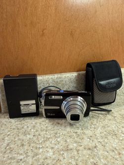 OLYMPUS Stylus 1010 10MP Digital Camera with 7x Optical Dual Image Stabilized Zoom (Black)