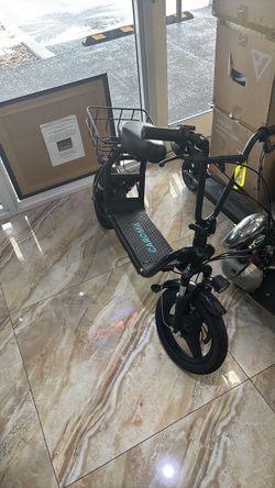 Caroma P1 Seated scooter