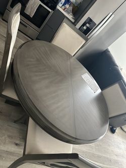 Gray Wood Oval Dining Table with Chairs