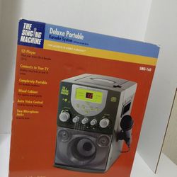 Karaoke Singing Machine With CD'S