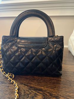 Black patent leather handbag