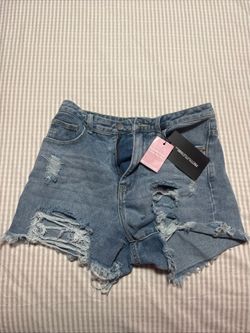 Light blue distressed shorts