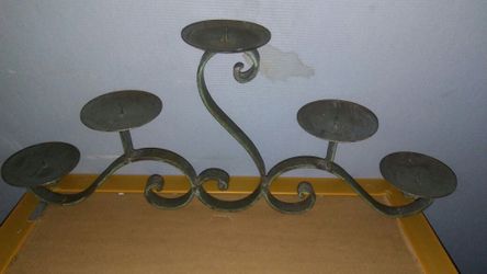 Solid iron candle holders