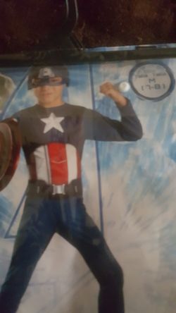 Captain America Halloween costume with shield. In good condition
