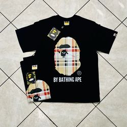Brand new a bathing ape bape  plaid (Burberry) graphic tshirt sizes: S M L includes tags and bag