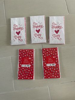 5 new packages of 12 paper bags with 3 different designs all for $4