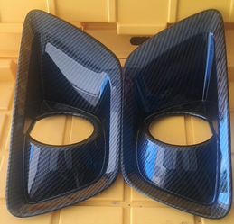 FRONT FOG LIGHT COVERS.