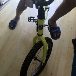 Green / yellow  Rocket bike/Huffy