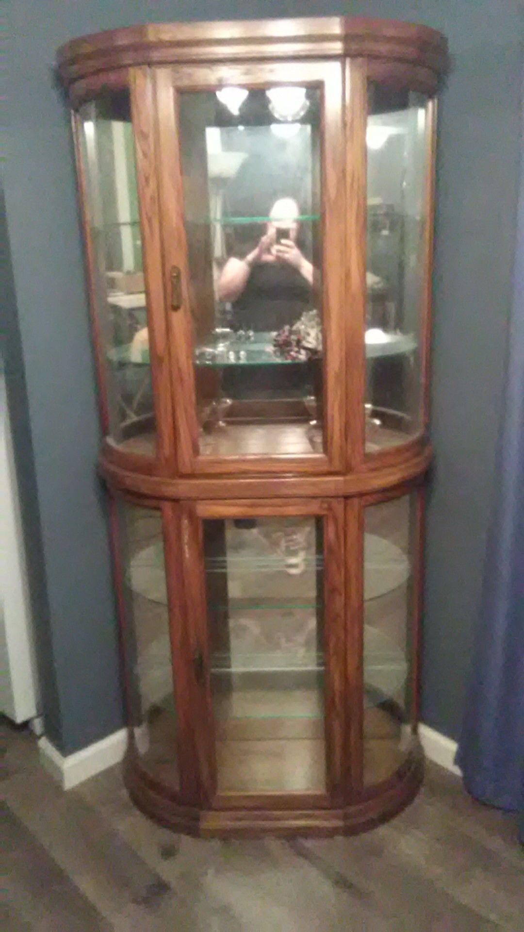 Twin antique glass curio cabinets