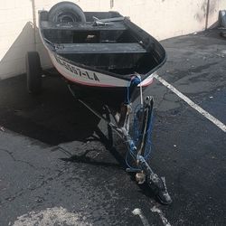 12 Ft. aluminum boat/trailer/2  1/2 HP motor