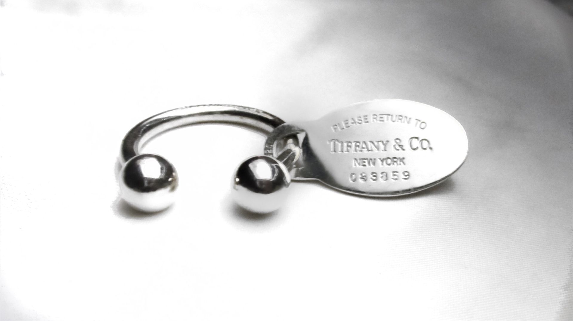 Tiffany and Co Sterling Silver Key Chain 150$ Retail