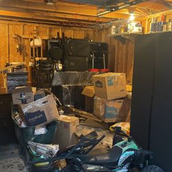 Garage Full Of Book Shelves and Furniture