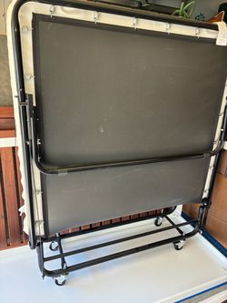 a portable rollaway folding guest bed