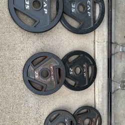 300 pound olympic set . included olympic barbell . also comes with weight tree 