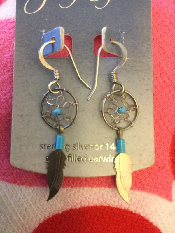 Western style silver earring . Dream catcher