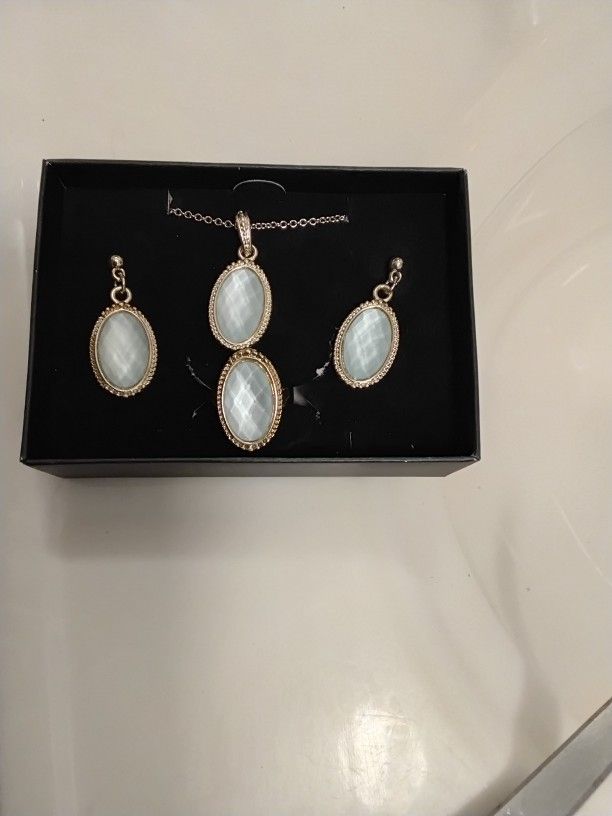 Matching Set Of Ring Earrings And Necklace