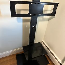 Used Swivel TV stand (for 32-65 inch TV)l