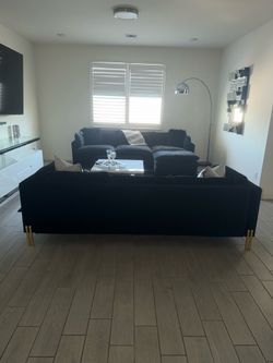Modern black velvet couch