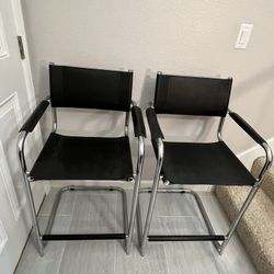 Two Captain High chairs