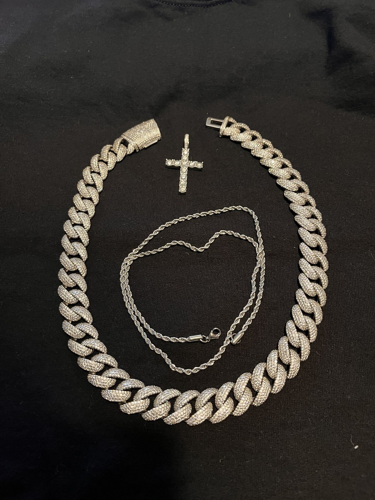 Silver Cuban Link Chain Set Featuring A Cross Pendant