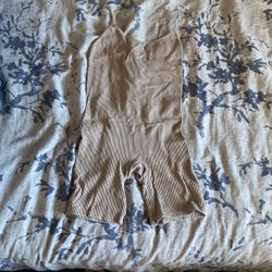 SUPER STRETCHY tan bodysuit. 